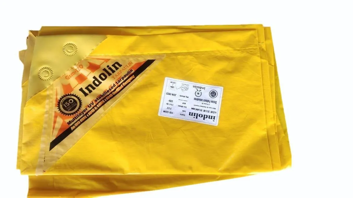 Folded yellow Indoline multilayer tarpaulin with product label